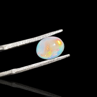 Opal from Ethiopia cabochon 8x6 mm no 759