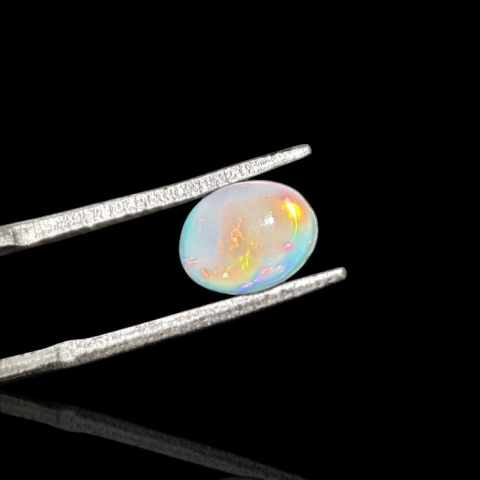Opal from Ethiopia cabochon 8x6 mm no 759 Opal from Ethiopia cabochon 8x6 mm no 759