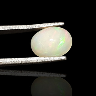 Opal from Ethiopia cabochon 9x7 mm no 714
