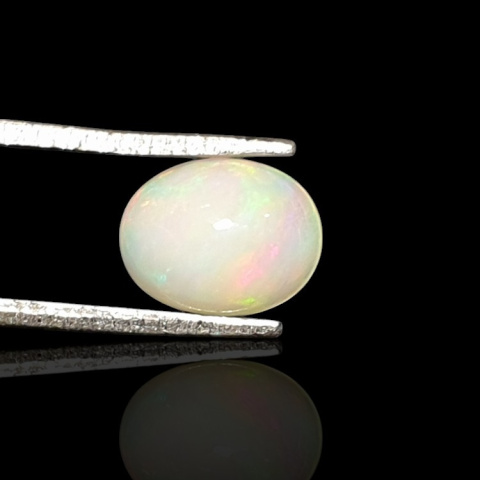 Opal from Ethiopia cabochon 9x7 mm no 714 Opal from Ethiopia cabochon 9x7 mm no 714