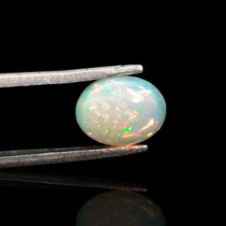 Opal from Ethiopia cabochon 9x7 mm no 715