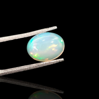Opal from Ethiopia cabochon 9x7 mm no 716
