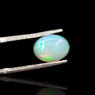 Opal from Ethiopia cabochon 9x7 mm no 716