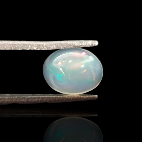 Opal from Ethiopia cabochon 9x7 mm no 717 Opal from Ethiopia cabochon 9x7 mm no 717