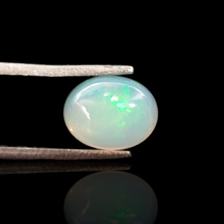 Opal from Ethiopia cabochon 9x7 mm no 719
