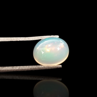 Opal from Ethiopia cabochon 9x7 mm no 719