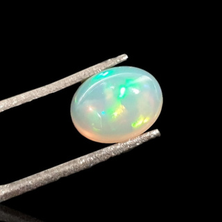 Opal from Ethiopia cabochon 9x7 mm no 721