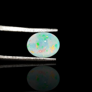 Opal from Ethiopia cabochon 9x7 mm no 724