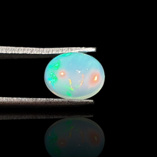 Opal from Ethiopia cabochon 9x7 mm no 725
