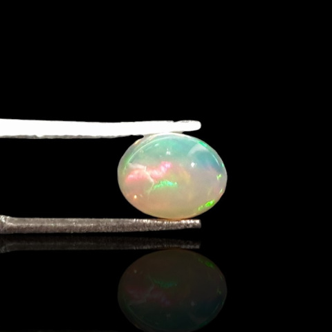 Opal from Ethiopia cabochon 9x7 mm no 726 Opal from Ethiopia cabochon 9x7 mm no 726