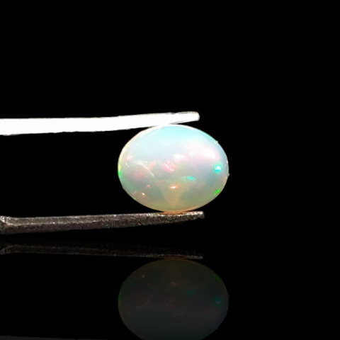 Opal from Ethiopia cabochon 9x7 mm no 726 Opal from Ethiopia cabochon 9x7 mm no 726