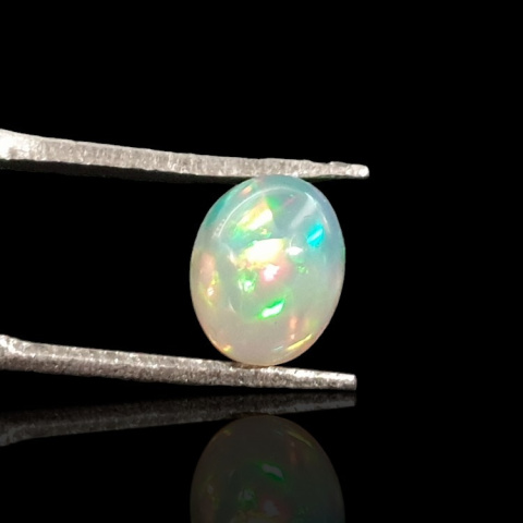 Opal from Ethiopia cabochon 9x7 mm no 728 Opal from Ethiopia cabochon 9x7 mm no 728