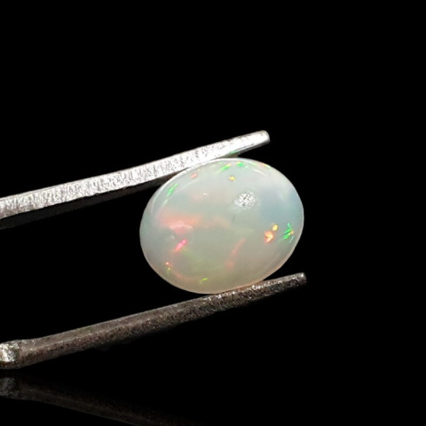 Opal from Ethiopia cabochon 9x7 mm no 729 Opal from Ethiopia cabochon 9x7 mm no 729