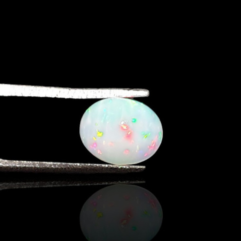 Opal from Ethiopia cabochon 9x7 mm no 733 Opal from Ethiopia cabochon 9x7 mm no 733