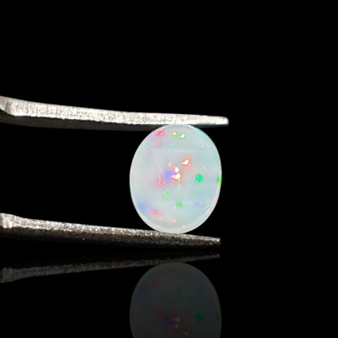 Opal from Ethiopia cabochon 9x7 mm no 733 Opal from Ethiopia cabochon 9x7 mm no 733