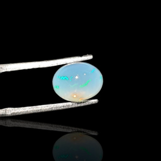 Opal from Ethiopia cabochon 9x7 mm no 734