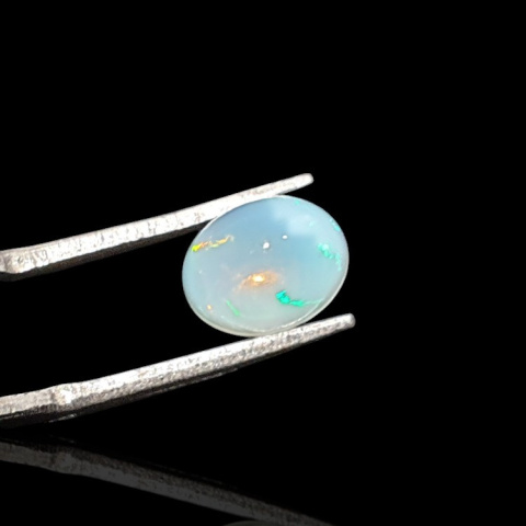 Opal from Ethiopia cabochon 9x7 mm no 734 Opal from Ethiopia cabochon 9x7 mm no 734