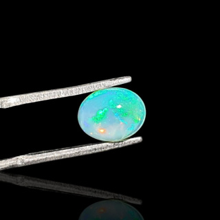 Opal from Ethiopia cabochon 9x7 mm no 735
