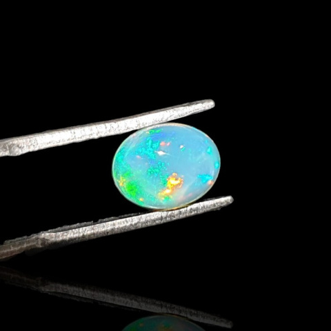 Opal from Ethiopia cabochon 9x7 mm no 735 Opal from Ethiopia cabochon 9x7 mm no 735
