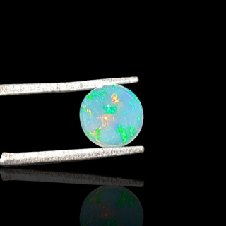 Opal from Ethiopia cabochon fi 7 mm no 790