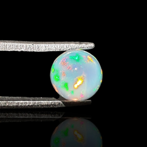 Opal from Ethiopia cabochon fi 7 mm no 791 Opal from Ethiopia cabochon fi 7 mm no 791