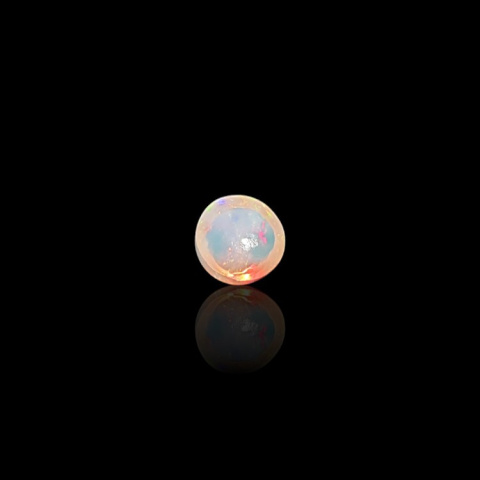 Opal from Ethiopia cabochon fi 7 mm no 791 Opal from Ethiopia cabochon fi 7 mm no 791