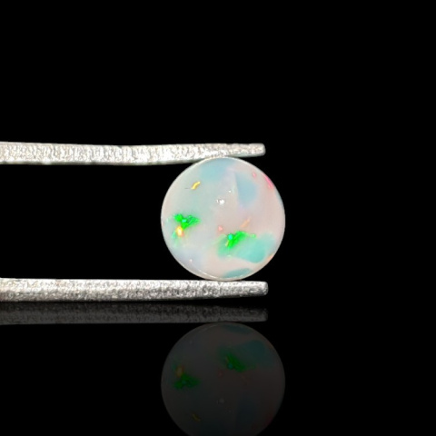 Opal from Ethiopia cabochon fi 7 mm no 792 Opal from Ethiopia cabochon fi 7 mm no 792