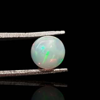Opal from Ethiopia cabochon fi 7 mm no 792