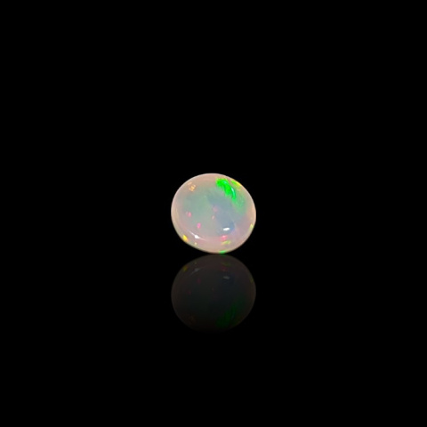 Opal from Ethiopia cabochon fi 7 mm no 792 Opal from Ethiopia cabochon fi 7 mm no 792