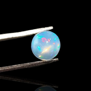 Opal from Ethiopia cabochon fi 7 mm no 793