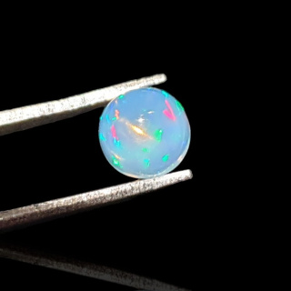 Opal from Ethiopia cabochon fi 7 mm no 793