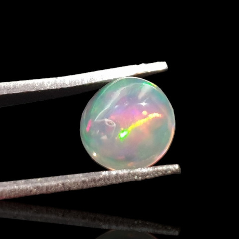 Opal from Ethiopia cabochon fi 7 mm no 794 Opal from Ethiopia cabochon fi 7 mm no 794