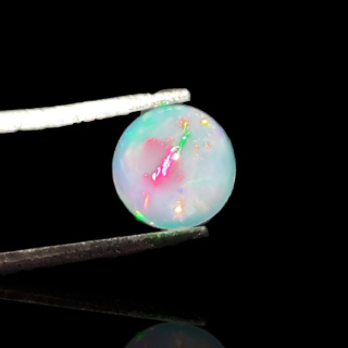 Opal from Ethiopia cabochon fi 7 mm no 794