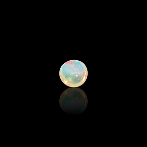 Opal from Ethiopia cabochon fi 7 mm no 794 Opal from Ethiopia cabochon fi 7 mm no 794