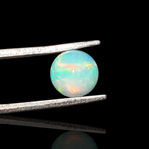 Opal from Ethiopia cabochon fi 7 mm no 795 Opal from Ethiopia cabochon fi 7 mm no 795