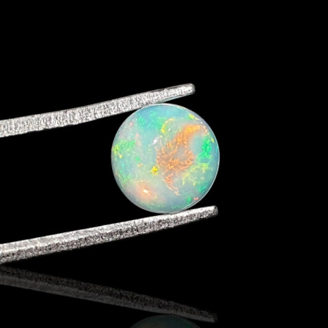 Opal from Ethiopia cabochon fi 7 mm no 795 Opal from Ethiopia cabochon fi 7 mm no 795