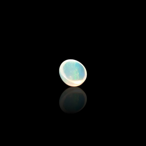 Opal from Ethiopia cabochon fi 7 mm no 795 Opal from Ethiopia cabochon fi 7 mm no 795