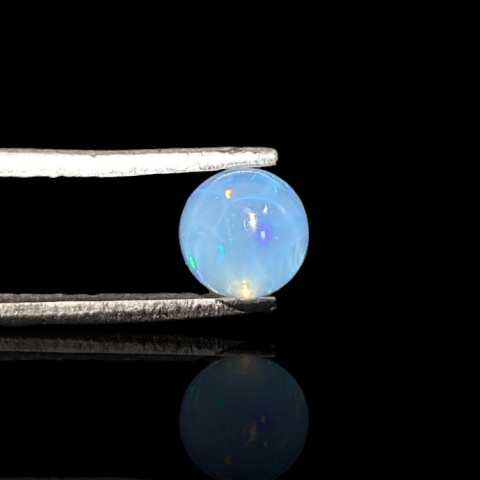 Opal from Ethiopia cabochon fi 6 mm no. 818 Opal from Ethiopia cabochon fi 6 mm no. 818