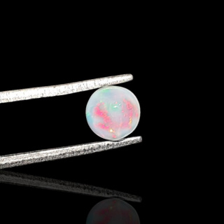 Opal from Ethiopia cabochon fi 6 mm no. 820