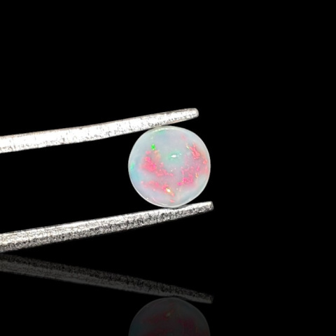 Opal from Ethiopia cabochon fi 6 mm no 820 Opal from Ethiopia cabochon fi 6 mm no 820