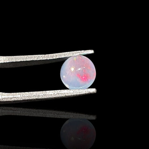 Opal from Ethiopia cabochon fi 6 mm no. 821 Opal from Ethiopia cabochon fi 6 mm no. 821