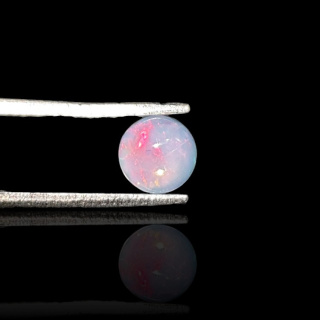 Opal from Ethiopia cabochon fi 6 mm no 821