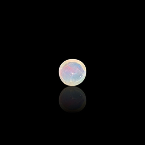 Opal from Ethiopia cabochon fi 6 mm no. 821 Opal from Ethiopia cabochon fi 6 mm no. 821
