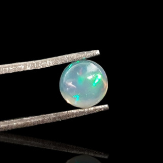 Opal from Ethiopia cabochon fi 6 mm no. 822