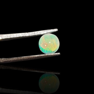 Opal from Ethiopia cabochon fi 6 mm no 823