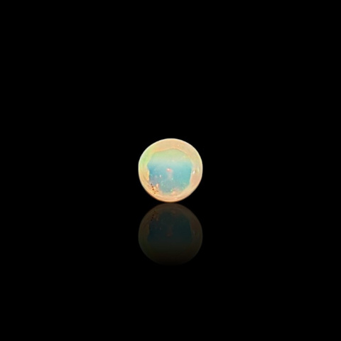 Opal from Ethiopia cabochon fi 6 mm no 823 Opal from Ethiopia cabochon fi 6 mm no 823