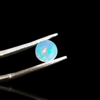 Opal from Ethiopia cabochon fi 6 mm no 824