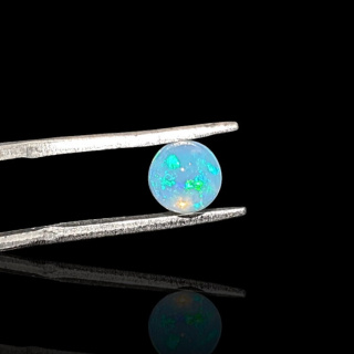 Opal from Ethiopia cabochon fi 6 mm no 824