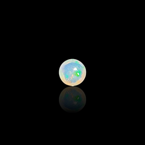 Opal from Ethiopia cabochon dia. 6 mm no 824 Opal from Ethiopia cabochon dia. 6 mm no 824