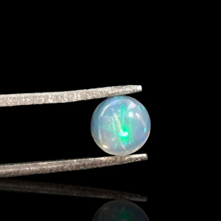 Opal from Ethiopia cabochon fi 6 mm no. 825